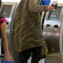LAX Airport Aaron Paul Olive Coat